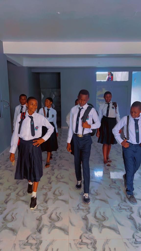 Students walking together along a corridor