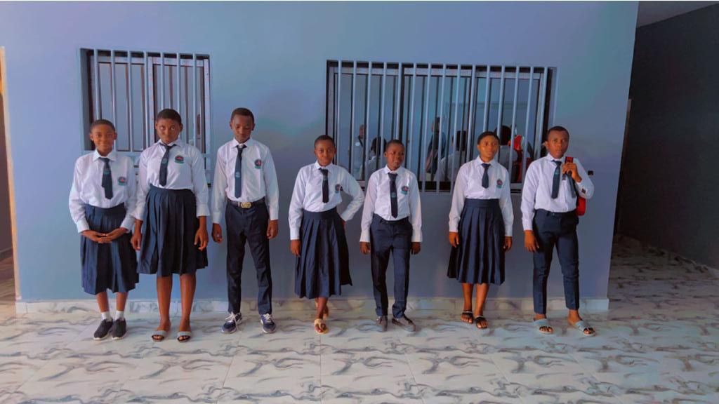 Holy Trinity students standing together in uniform