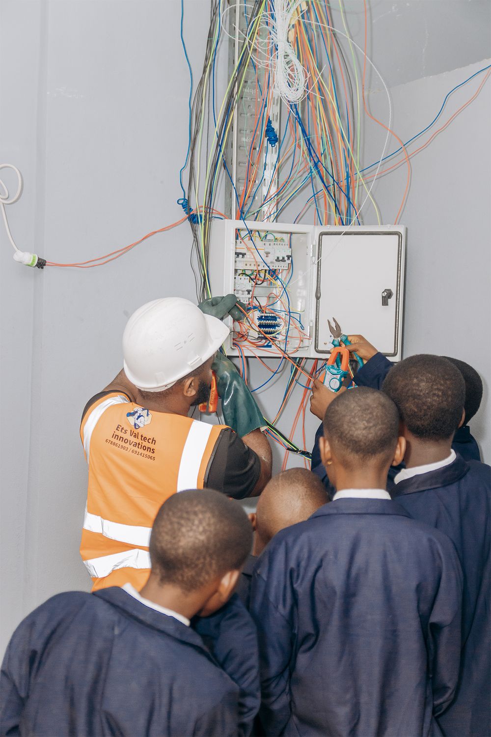 Students learning electrical installation